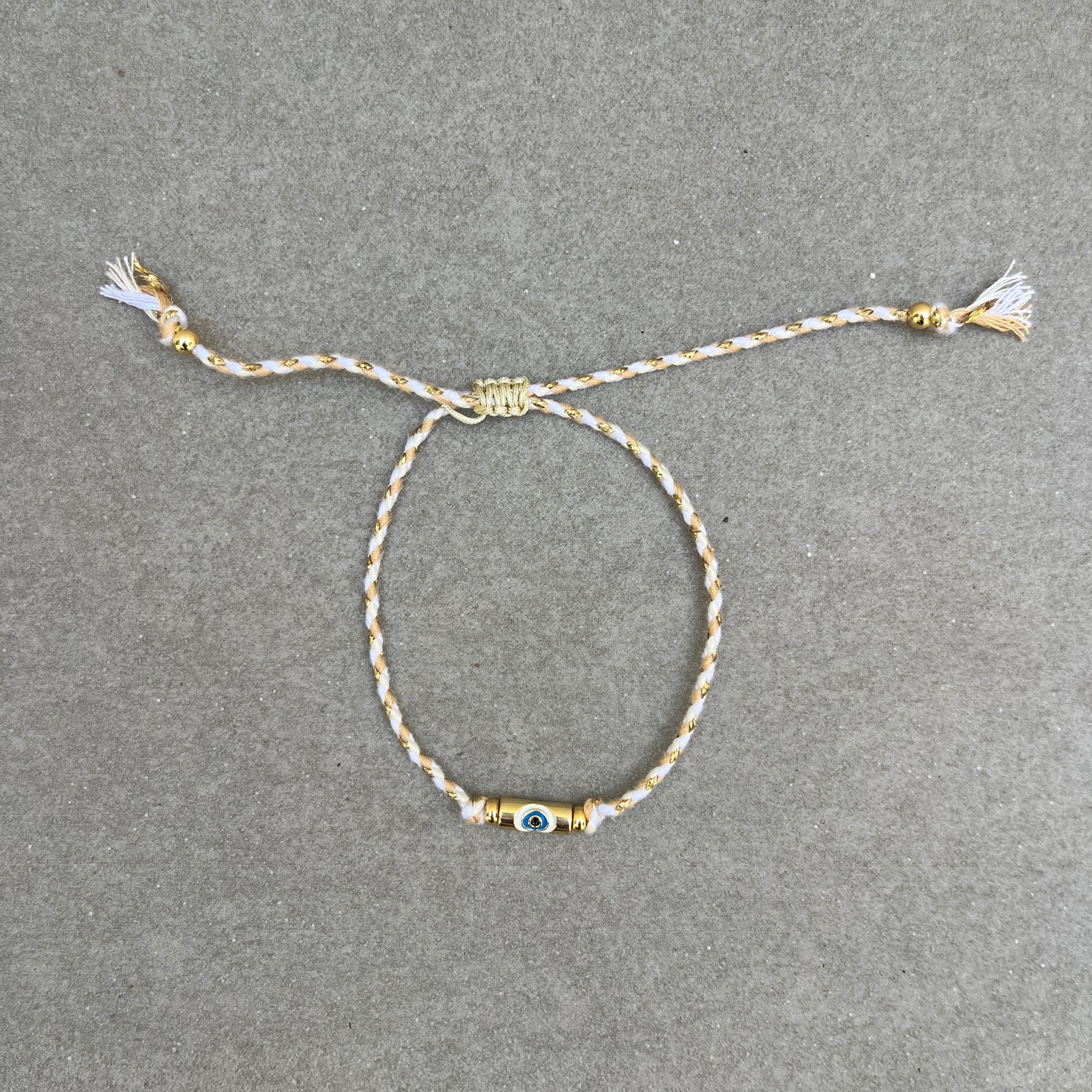 Gold String Eye