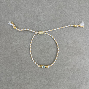 Gold String Eye