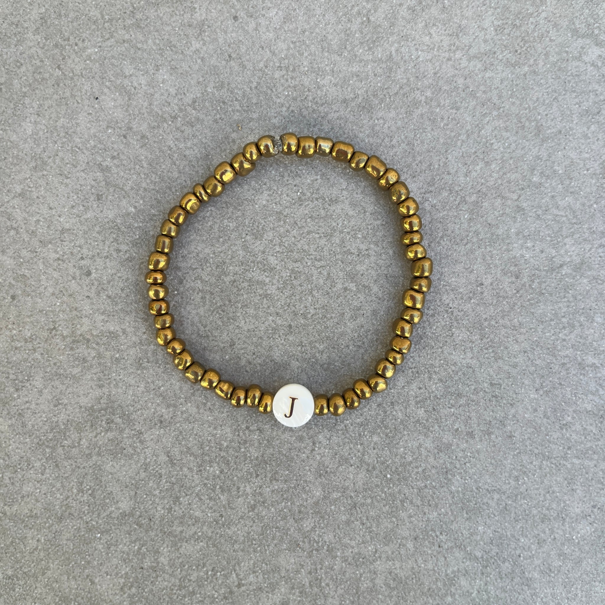 Shell Initial J